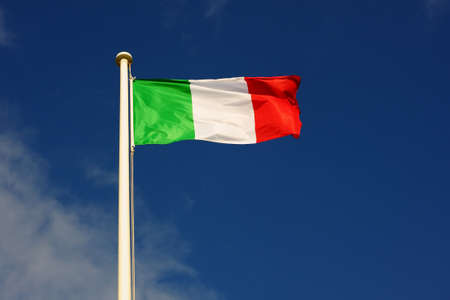 Italian flag with blue sky background