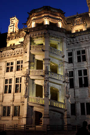 The spiral staircase of the ChÃ¢teau de Blois during sound and light showのeditorial素材