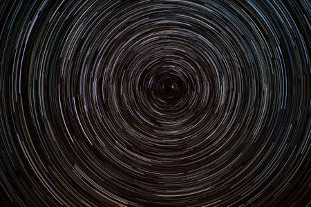 Sky at night with startrailsの写真素材