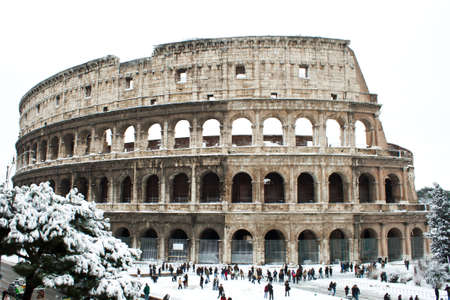 Rome, Italy, 4 February 2012 - Amazing view of the Coliseum with snow. Snowfalls in Rome are very...