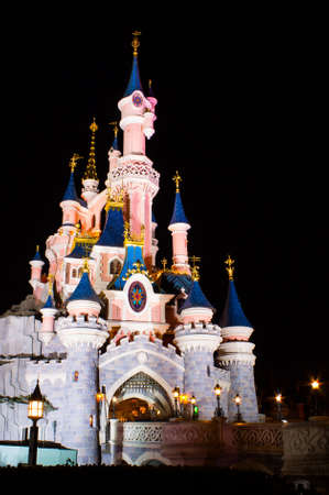Paris, France, 18 February 2012 - Disneyland Paris Castle illuminated at night. Disneyland Paris is a holiday and recreation resort in Paris. It is the most visited themed attraction of Europe.のeditorial素材
