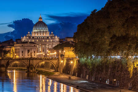 St. Peterâs Basilica at night in Rome, Italyの写真素材