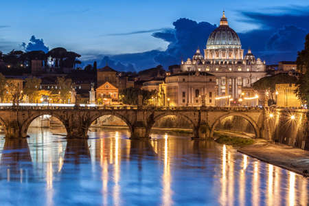 St. Peterâs Basilica at night in Rome, Italyの写真素材