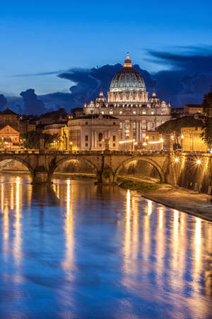 St. Peterâs Basilica at night in Rome, Italyの写真素材