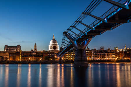 London, England, August 3, 2013 - St Paul Cathedral and Millennium Bridge at night のeditorial素材
