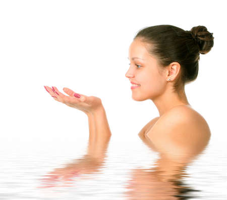 Perfect female torso. On a white background with reflection in waterの写真素材