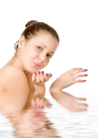 Perfect female torso. On a white background with reflection in waterの写真素材