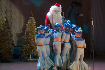 DNEPROPETROVSK, UKRAINE - JANUARY 4: Unidentified girls, ages 6-9 years old, perform CHRISTMAS REGATTA at the Philharmonic on January 4, 2014 in Dnepropetrovsk, Ukraineのeditorial素材