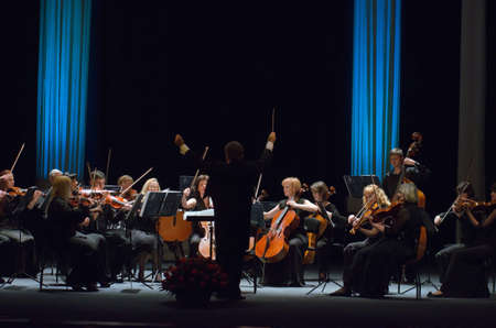 DNIPROPETROVSK, UKRAINE - MAY 26: FOUR SEASONS Chamber Orchestra - main conductor Sergey Burko perform at the State Russian Drama Theatre on May 26, 2015 in Dnipropetrovsk, Ukraineのeditorial素材