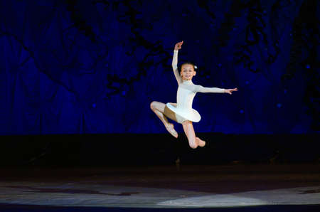 DNIPROPETROVSK, UKRAINE - JANUARY 11: An unidentified girl, age 9 years old, performs Ballet pearls at State Opera and Ballet Theatre on January 11, 2015 in Dnipropetrovsk, Ukraineのeditorial素材