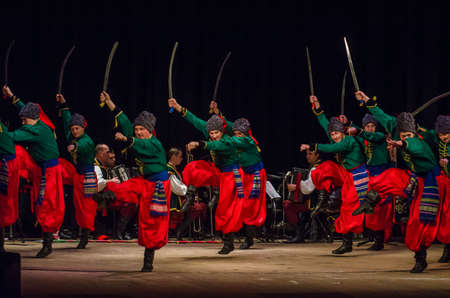 DNIPRO, UKRAINE - NOVEMBER 7, 2018: National traditions, customs and rites of the Ukrainian people performed by members of the Folklore Ensemble SLAVUTYCH  at the  State Drama  Theatre.のeditorial素材