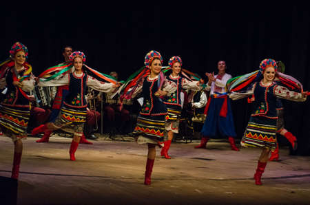 DNIPRO, UKRAINE - NOVEMBER 7, 2018: National traditions, customs and rites of the Ukrainian people performed by members of the Folklore Ensemble SLAVUTYCH  at the  State Drama  Theatre.のeditorial素材