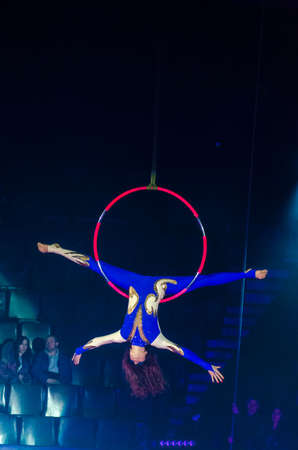 DNIPRO, UKRAINE - DECEMBER 14, 2018: Aerial gymnast Anna Rumyantseva performs at the Circus.のeditorial素材