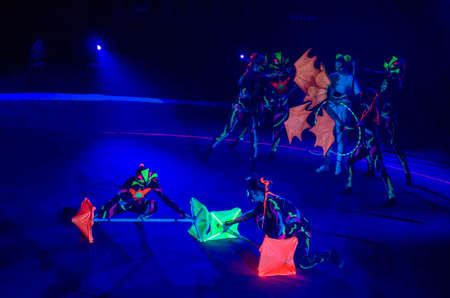 DNIPRO, UKRAINE - DECEMBER 14, 2018: Members of the Melange-art studio perform Neon show at the Circus.のeditorial素材