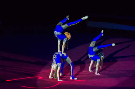 DNIPRO, UKRAINE - DECEMBER 14, 2019: Unidentified girls, age 10 years old, perform acrobatics at the Circus.のeditorial素材