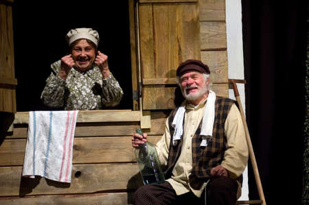 DNEPROPETROVSK, UKRAINE - NOVEMBER 28: Members of the Dnepropetrovsk State Russian Drama Theatre perform " World home to your " on November 28, 2009 in Dnepropetrovsk, Ukraineのeditorial素材