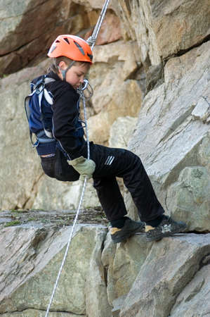 DNEPROPETROVSK, UKRAINE - APRIL 2: Ukrainian boy in action during urban mountaineering competitions among children on April 2, 2011 in Dnepropetrovsk, Ukraineのeditorial素材