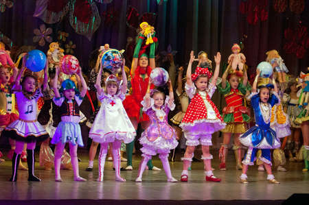 DNEPROPETROVSK, UKRAINE - JUNE 4: Unidentified Children, ages 4-8 years old, perform musical spectacle "Neznaika" on June 4, 2011 in Dnepropetrovsk, Ukraineのeditorial素材