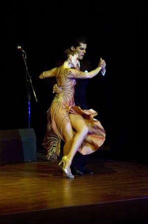 DNEPROPETROVSK, UKRAINE  NOVEMBER 4: The dancers Ruben & Sabrina Veliz (Argentina, Buenos Aires) at World Stars Tango show on November 4, 2011 in Dnepropetrovsk, Ukraineのeditorial素材