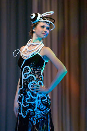 DNEPROPETROVSK, UKRAINE - MARCH 25: Ukrainian girl shows off his own clothes for unidentified young Ukrainian designer at FASHION TOWN  show on March 25, 2010 in Dnepropetrovsk, Ukraineのeditorial素材