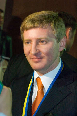 KRYVOY ROG, UKRAINE MAY 14: President of FC Shakhtar Rinat Akhmetov gives an interview to reporters after golden  match of Uk. League between FC Shakhtar and FC Dynamo on May 14, 2006 in Kryvoy Rog, Ukraineのeditorial素材