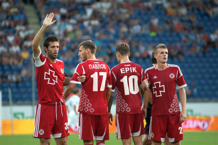 DNEPROPETROVSK, UKRAINE - AUGUST 26: Footballers FC Volyn build wall during the match of Ukrainian Championship game against FC Dnepr on August 26, 2012 in Dnepropetrovsk, Ukraine.のeditorial素材