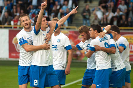 DNEPROPETROVSK, UKRAINE - OCTOBER 7: Footballers FC Dnipro celebrate goal during their Ukr....