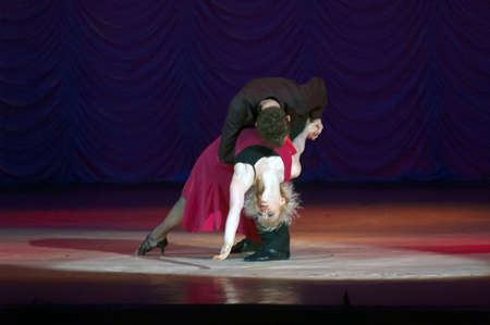DNEPROPETROVSK, UKRAINE – DECEMBER 30: The famous dancers Alexandra Tropko and Ivan Suslov perform...
