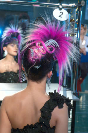 DNEPROPETROVSK, UKRAINE - MARCH 22: Model prepares backstage during the Championship on hairdressing, nail aesthetics and make YOUNG TALENTS OF UKRAINE on Mach 22, 2007 in Dnepropetrovsk, Ukraineのeditorial素材