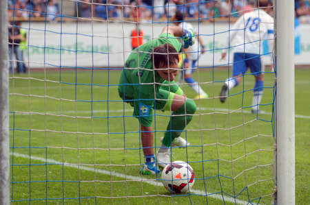 DNIPROPETROVSK, UKRAINE - MAY 18: FC Metallurg D goalkeeper Yuri Pankiv in action during soccer match vs FC Dnipro on May 18, 2014 in Dnipropetrovsk, Ukraineのeditorial素材