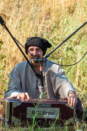 DNIPRO, UKRAINE - JUNE 27, 2020: Kozak Siromakha performes at the Dnipro park.