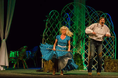 DNIPRO, UKRAINE - NOVEMBER 23, 2020: Ilona Solyanik and Alexander Golubenko perform For a strange acquaintance at the Dnipro State Drama and Comedy Theater.のeditorial素材