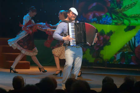 DNEPROPETROVSK, UKRAINE - APRIL 1: Members of the Regional Philharmonic perform show ODESSA YARD at the Philharmonic on April 1, 2014 in Dnepropetrovsk, Ukraineのeditorial素材