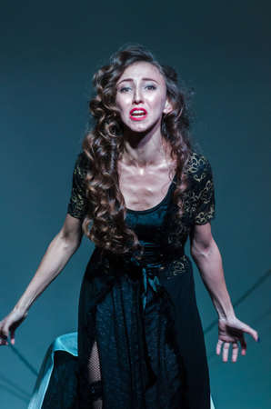 DNIPRO, UKRAINE - NOYEMBER 29, 2020: Elena Lomonosova perfomes Tales of the Decade at the Youth Theater Mirror.のeditorial素材