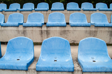 Empty seats in an old football stadium.の写真素材