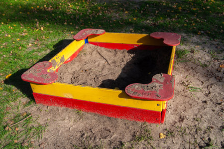 Old sandbox for small children to playの写真素材
