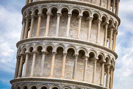 close-up of Leaning tower of Pisa with blue sky on background 
の写真素材