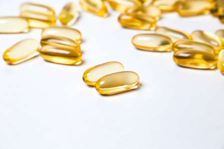 omega 6: conjugated linoleic acid (CLA) in capsules on the white background 