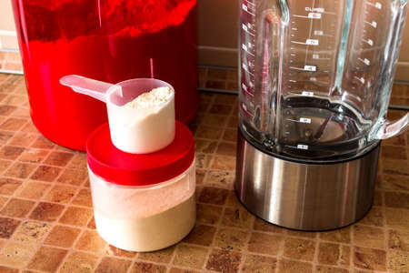 sport nutrition, supplements: protein, pre-workout complex, bcaa and guide for it (in the kitchen) の写真素材