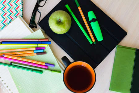 student education kit (set): notebook, pen, pencil case, gadget, cup. Top view (flat lay)の写真素材