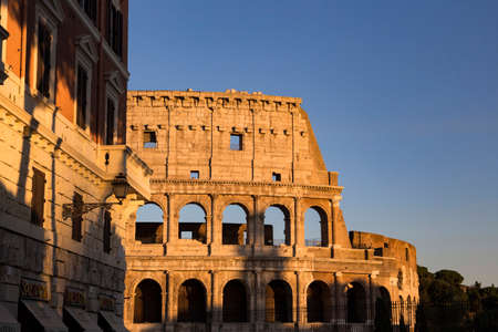 Part of the wall of Colosseum (Coliseum) in Rome, Italy at sunset
