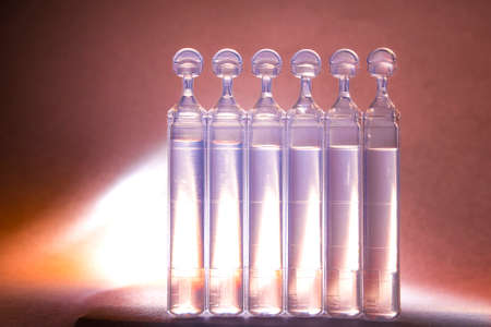 Blank mock up advertising with copy space of the bufus - plastic ampoule (drop, vial) isolated on...