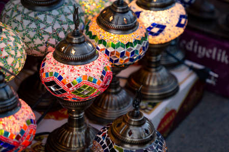Shop with traditional mosaic multi colored turkish lamps or lanterns. Popular souvenir from Turkey. Istanbul, Turkey, 2019-08-10のeditorial素材