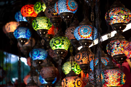 Shop with traditional mosaic multi colored turkish lamps or lanterns. Popular souvenir from Turkey. Istanbul, Turkey, 2019-08-10のeditorial素材
