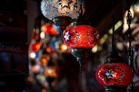 Shop with traditional mosaic multi colored turkish lamps or lanterns. Popular souvenir from Turkey. Istanbul, Turkey, 2019-08-10のeditorial素材