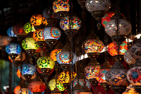 Shop with traditional mosaic multi colored turkish lamps or lanterns. Popular souvenir from Turkey. Istanbul, Turkey, 2019-08-10のeditorial素材