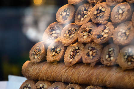 Traditional delicious turkish desserts in the shop window showcase. Different kinds of turkish...