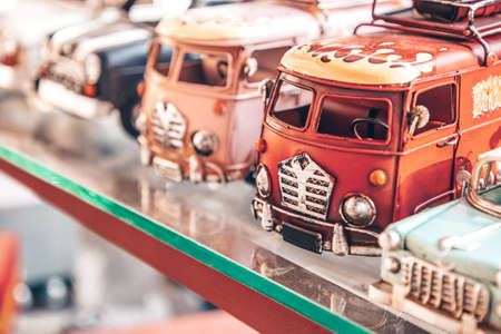 Big collection of retro car models on the shelf. Miniatures of colorful vintage vehicles in the shop. Turkey, Istanbul, 2019-08-18のeditorial素材