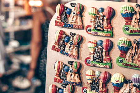 Showcase with fridge magnets. Shopping and travel concept. Souvenirs from Cappadocia, Turkey...