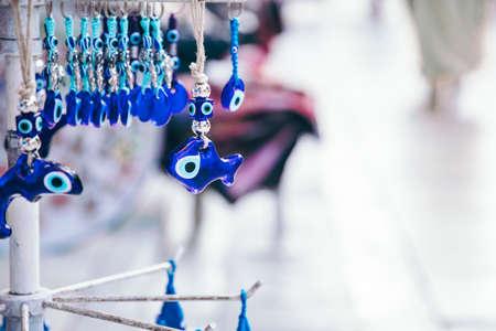 Evil eye bead protection amulet in the shop or market. One of the most popular souvenirs from Istanbul, Turkey 2019-08-18のeditorial素材